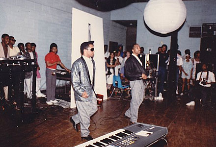 Chip E. and Keith Irving performing at Mendel Catholic Prep School