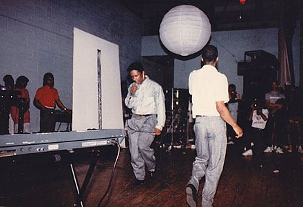 Chip E. and Keith Irving performing at Mendel Catholic Prep School